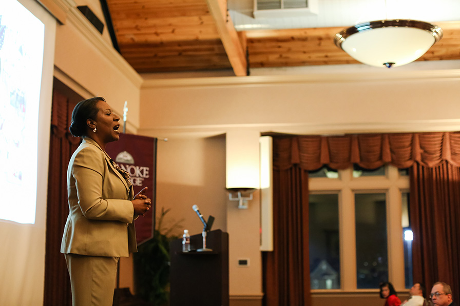 Christy Coleman speaking at the Women's Forum