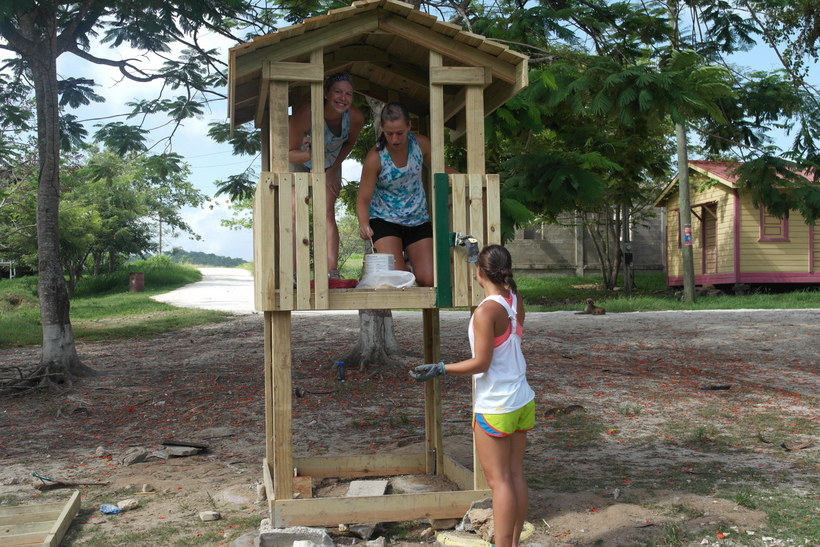 Students working on a construction project in a Latin American country