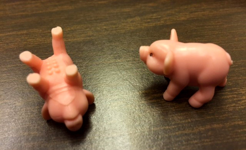 Two pig figurines