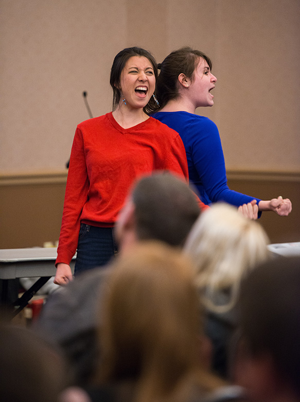 Two performers belt out a song in a production of Calculus The Musical