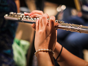 student playing instrument