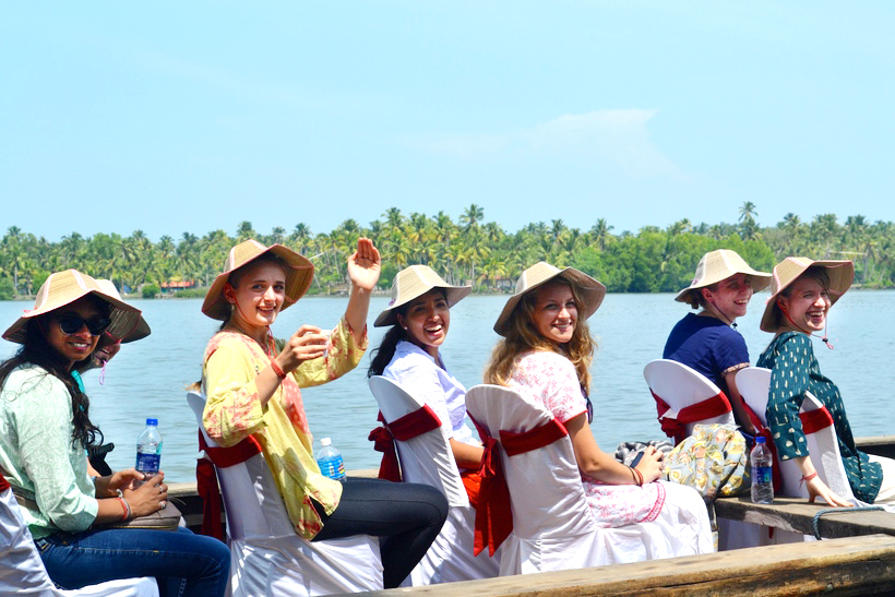 Students in a boat on the river