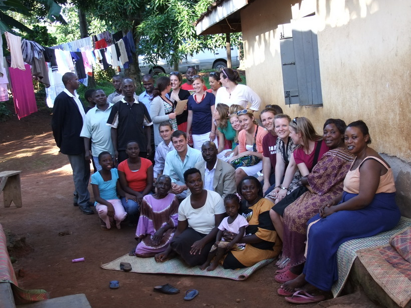 Students and Dr. Rubongoya with community members
