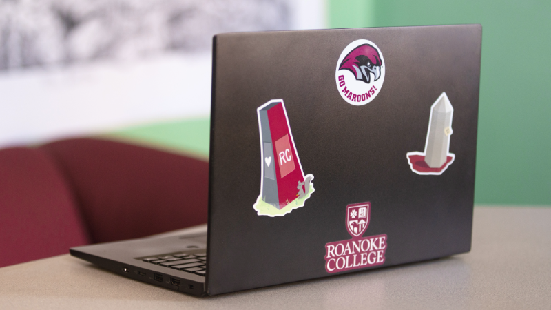 Laptop decorated with Roanoke College stickers