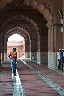 Student inside an old building in India