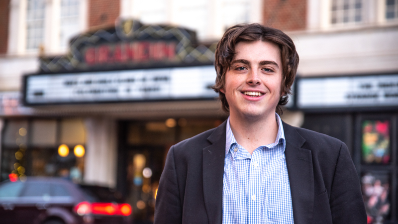 Owen Collander standing in front of Grandin Theatre