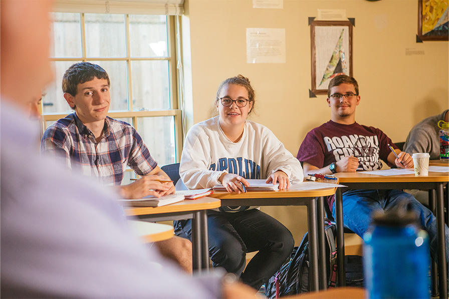 Students engaged in discussion in a classroom