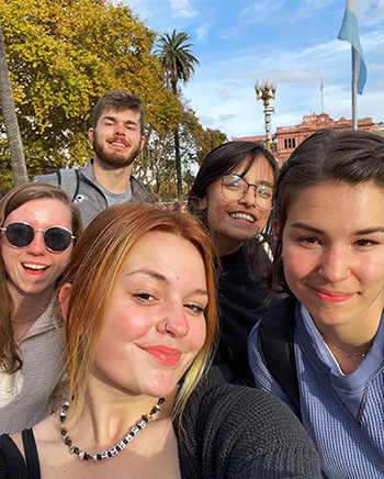 Five students pictured in selfie style picture
