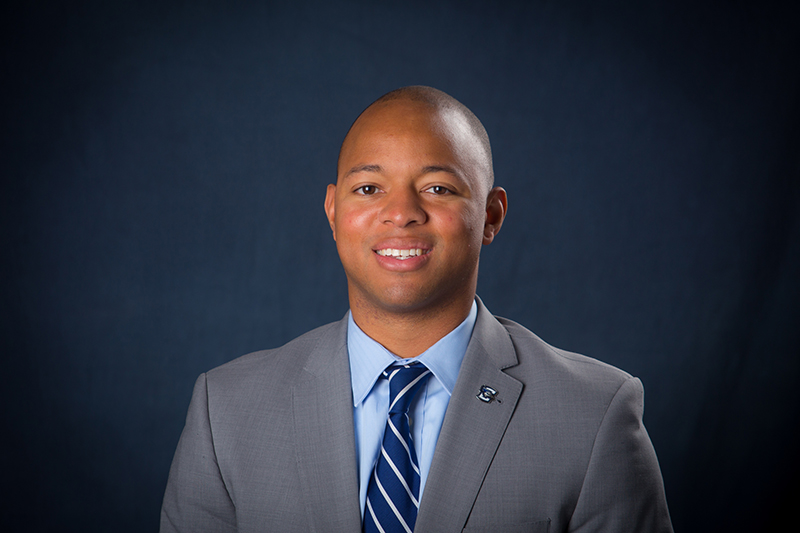 Adrian Dowell pictured in suit and tie