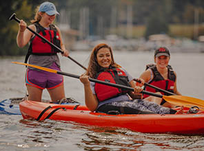 students kayaking