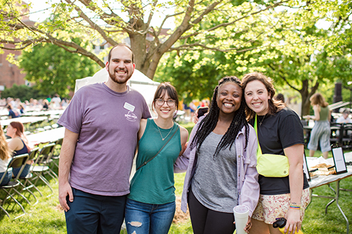 alumni at fotq on the back quad