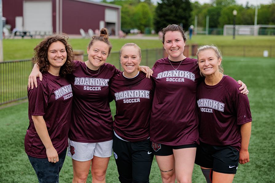 group of alumni all wearing maroon