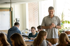 instructor and students in lab