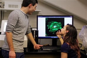 students looking at a computer