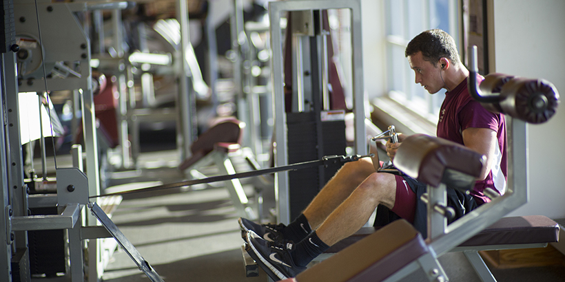 a student working out in the fitness center