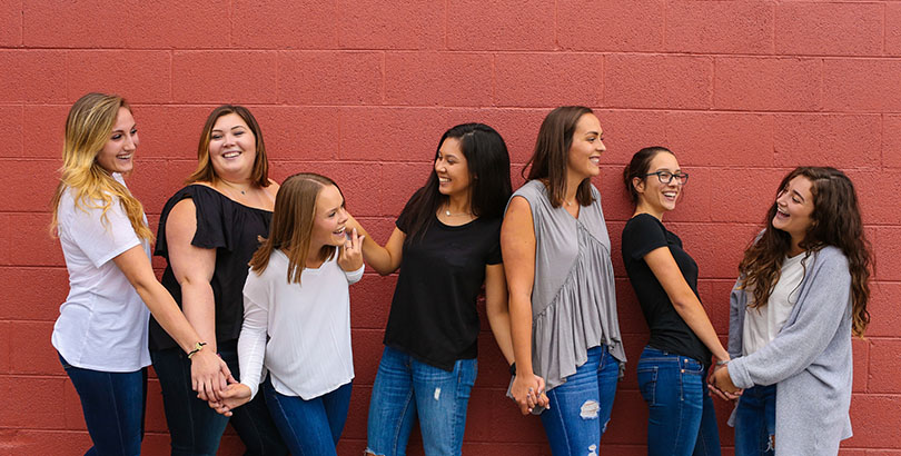 Students posing for a photo during Greek Week