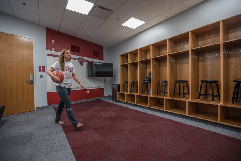 A student walking in the Cregger Center womens' locker room