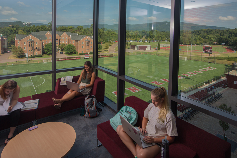 Students relaxing in the lounge of the Cregger Center