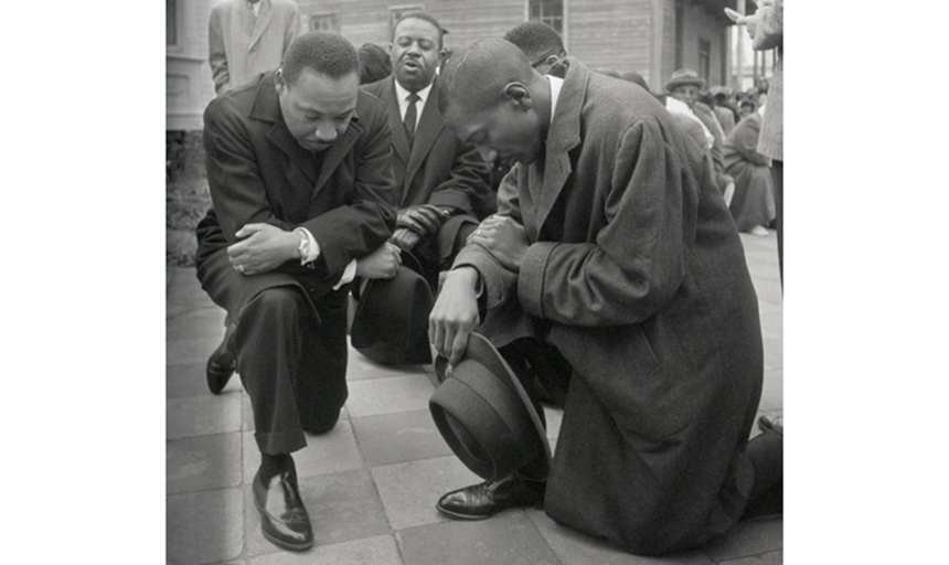 MLK jr and others praying