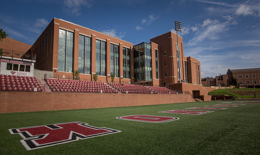 A photo of the field and the back of the Cregger Center