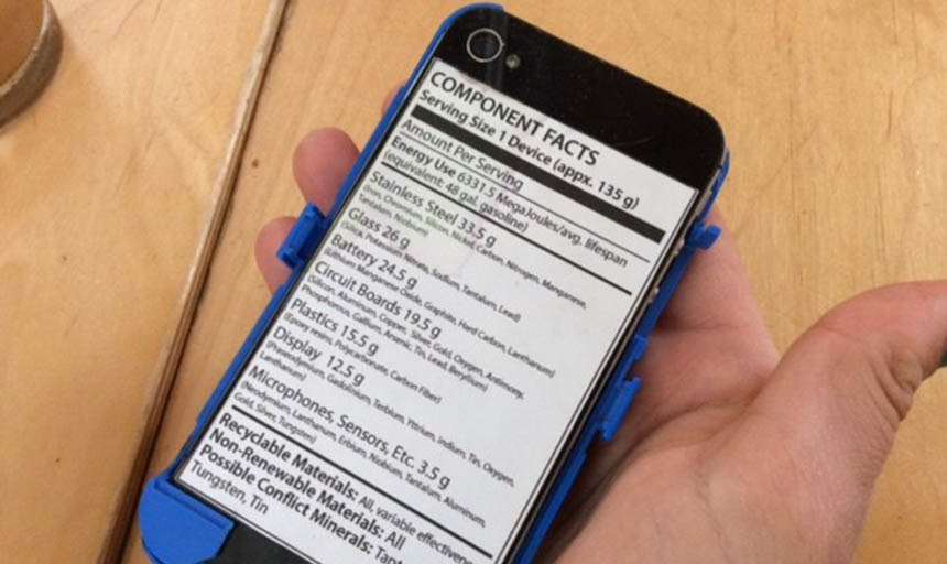 Hand holding an iPhone with a list of components on the back