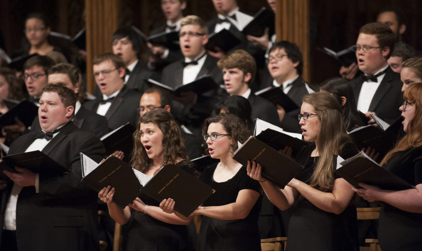 students in choir singing