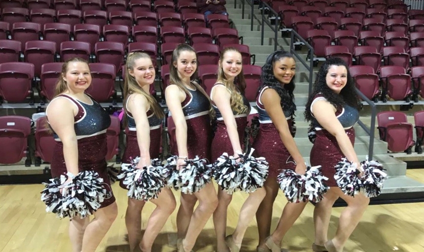 The Dance team posing for a photo