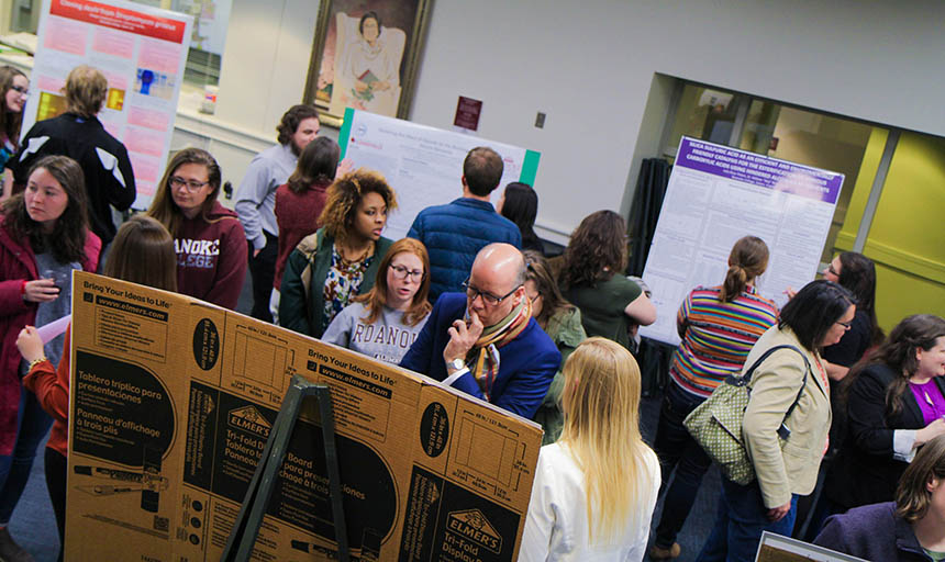 An overhead shot of a crowd of people at the showcase of research and creativity