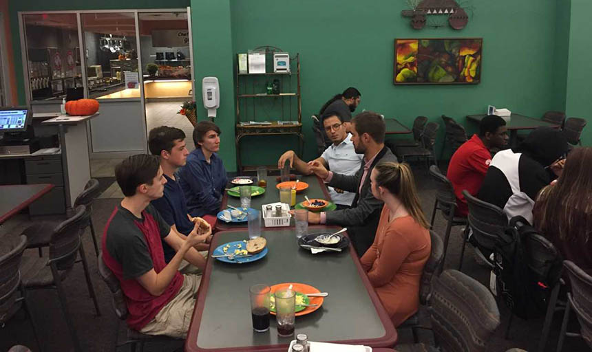 Members of CEO having a meal together