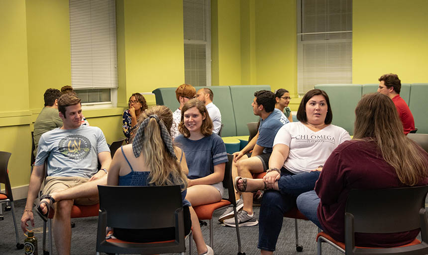 Students talking at a SpeakEasy event