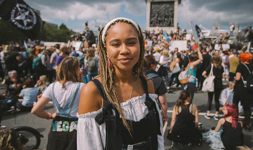 A photo of Mikaela Loach at a climate protest