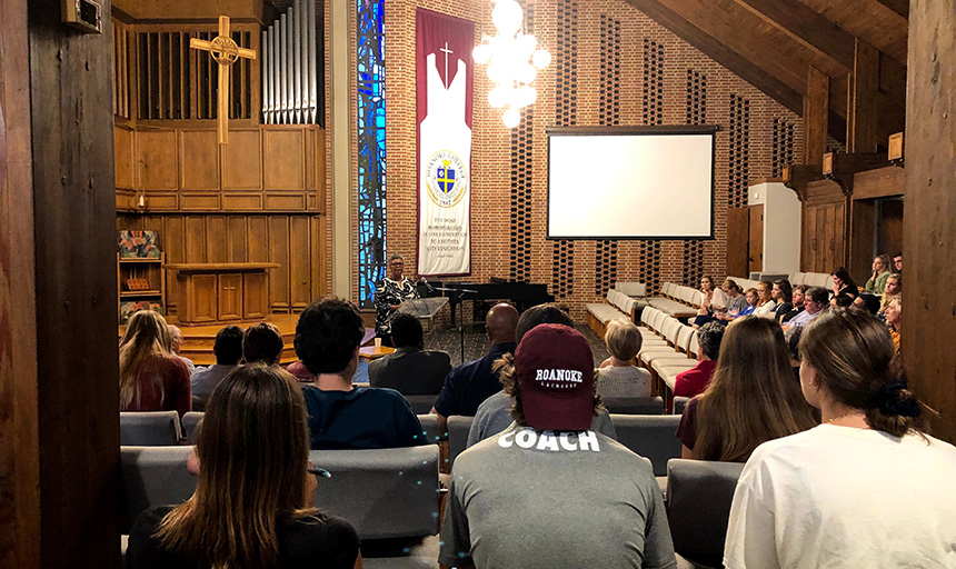 photo of students gathered in the campus chapel for a past service