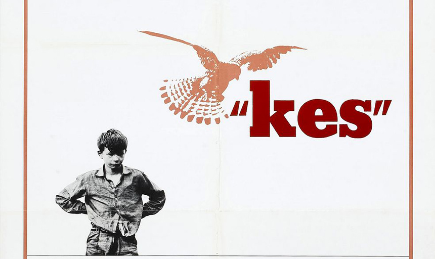 Kes. Boy standing with a bird flying above.