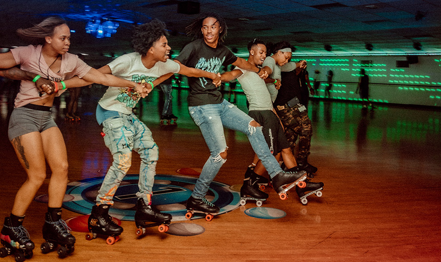 image of young people at a skate rink