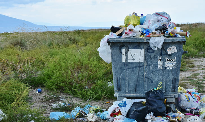 Dumpster overflowing with trash