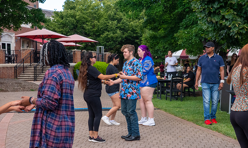 Students salsa dancing 