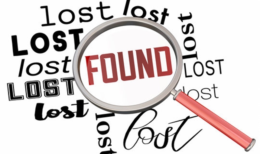 magnifying glass highlighting the word "Found" surrounded by the word "Lost"