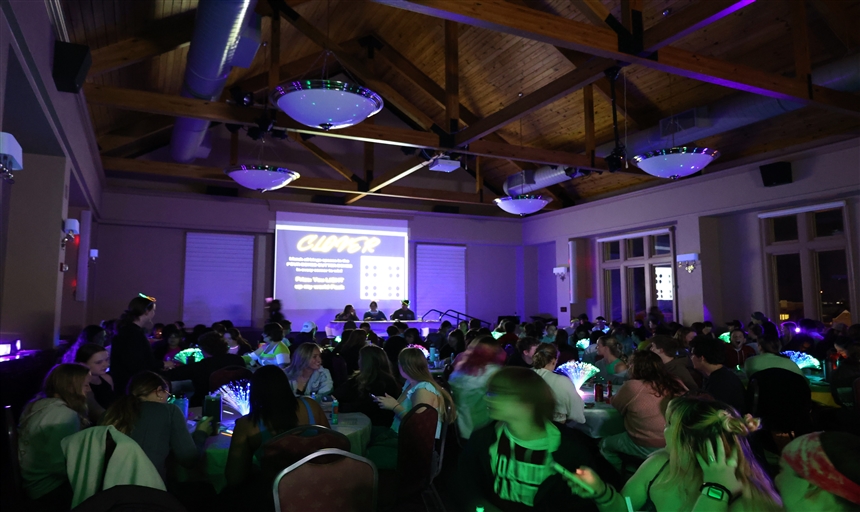 students gathered in the ballroom of Colket playing bingo