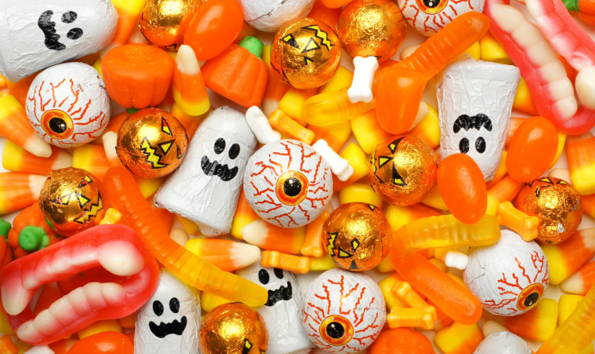 Halloween candy in the shape of ghosts, pumpkins and skeleton bones
