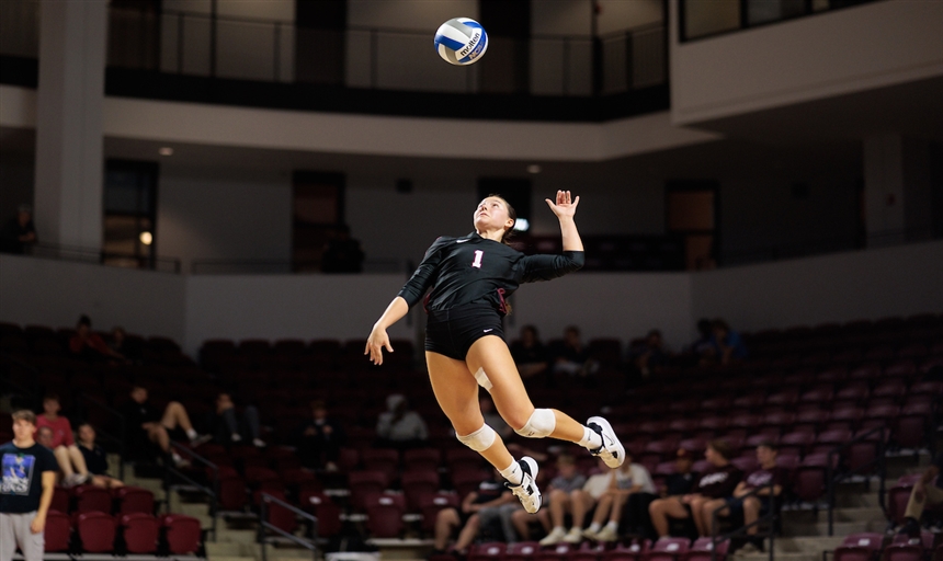 volleyball player hitting a ball