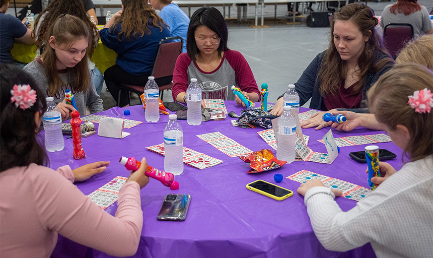 student playing bingo at a round table