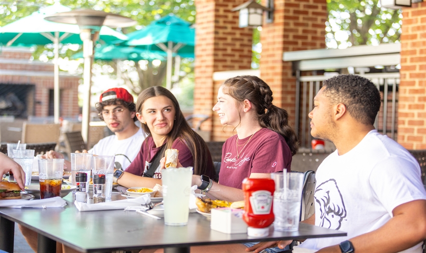 students eating lunch at Mac and Bobs 