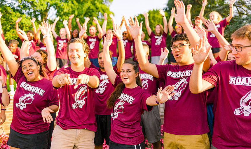 Students smiling and celebrating move-in day
