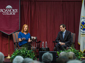 two people on stage speaking