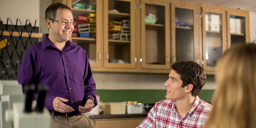 Chris Lassiter talking to students in class