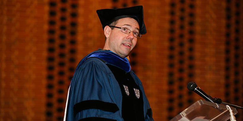 Chris Lassiter giving a speech at a Phi Beta Kappa event