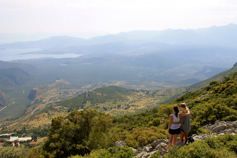 Students on a mountain looking over the town below