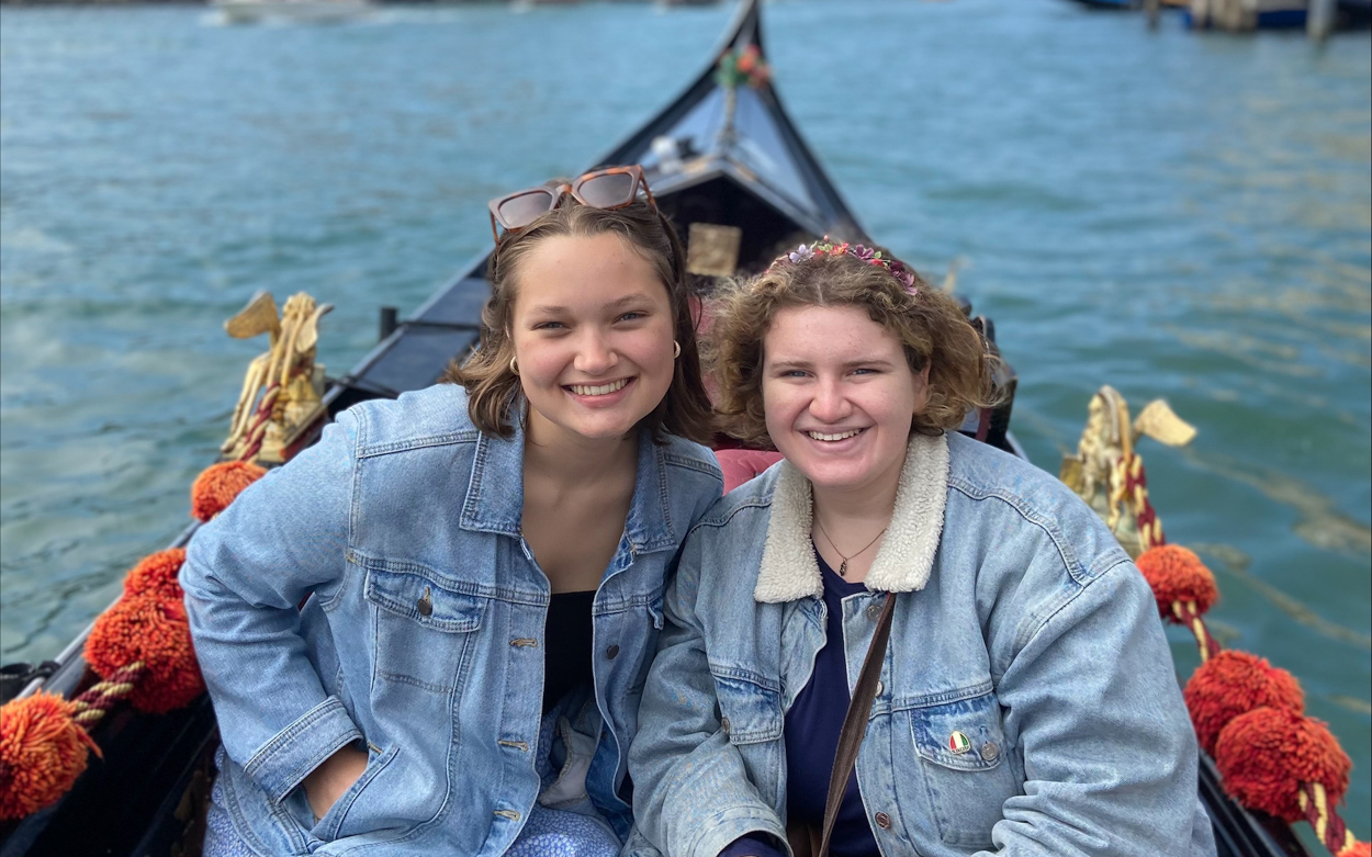 Student in a boat in Italy