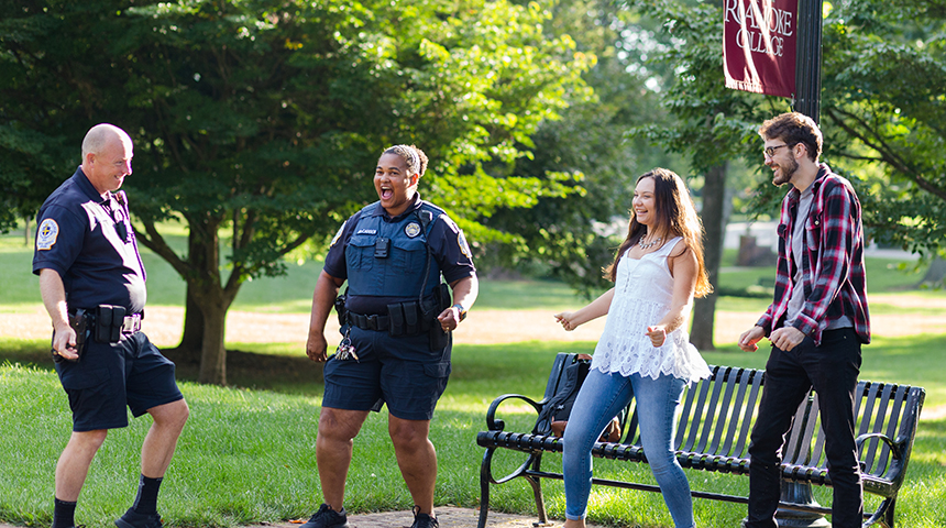 Students dancing with RC campus police.