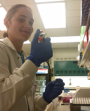 Dr. Melissa Puppa working in the lab